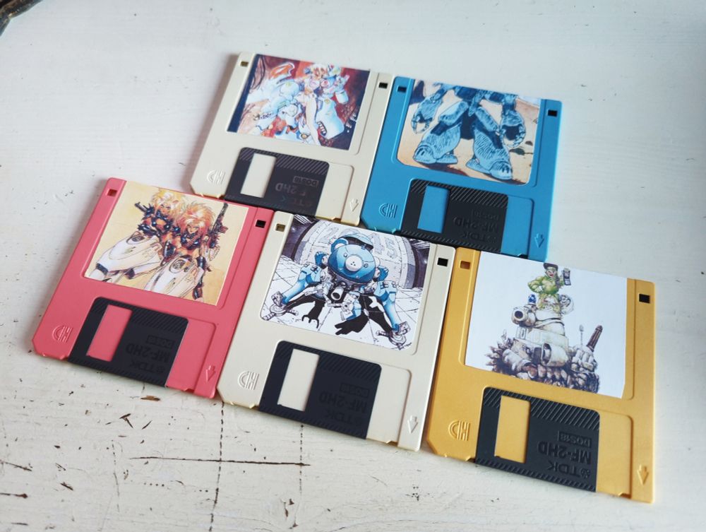 Five floppy disks with custom labels