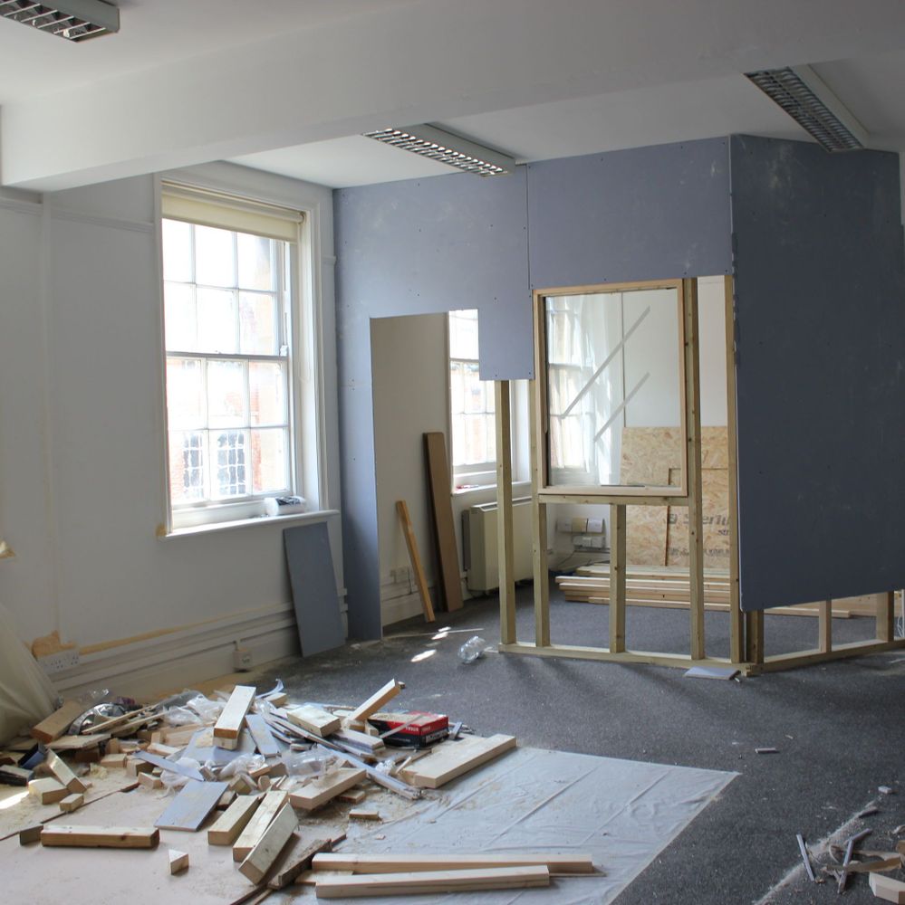 A room with partially finished dividing walls