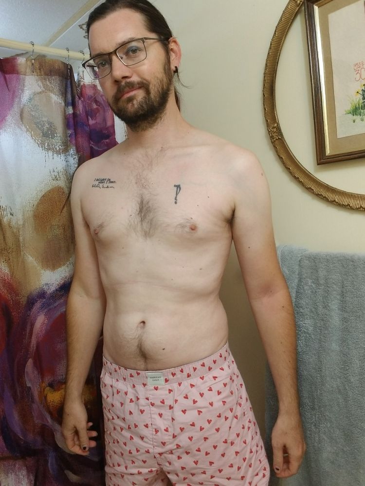 A selfie of me wearing heart-print boxers