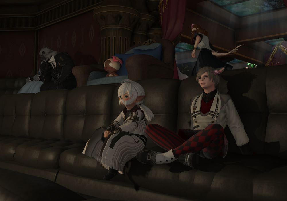Victor and Denmo mcstronghuge sitting in a theater
