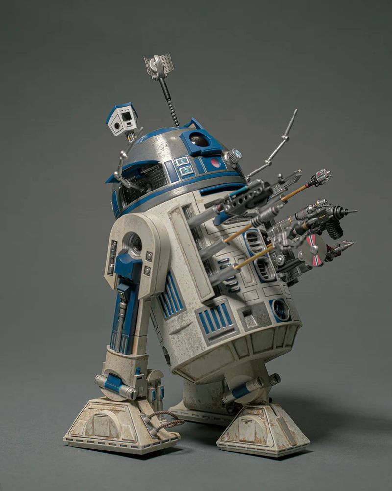 R2D2 model with a lot of tools sticking out, ranging from "hmmm..." to "OW OW OW STOP"