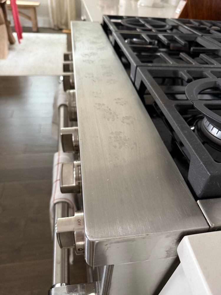 there are little kitty cat paw prints on my stove. this is illegal.