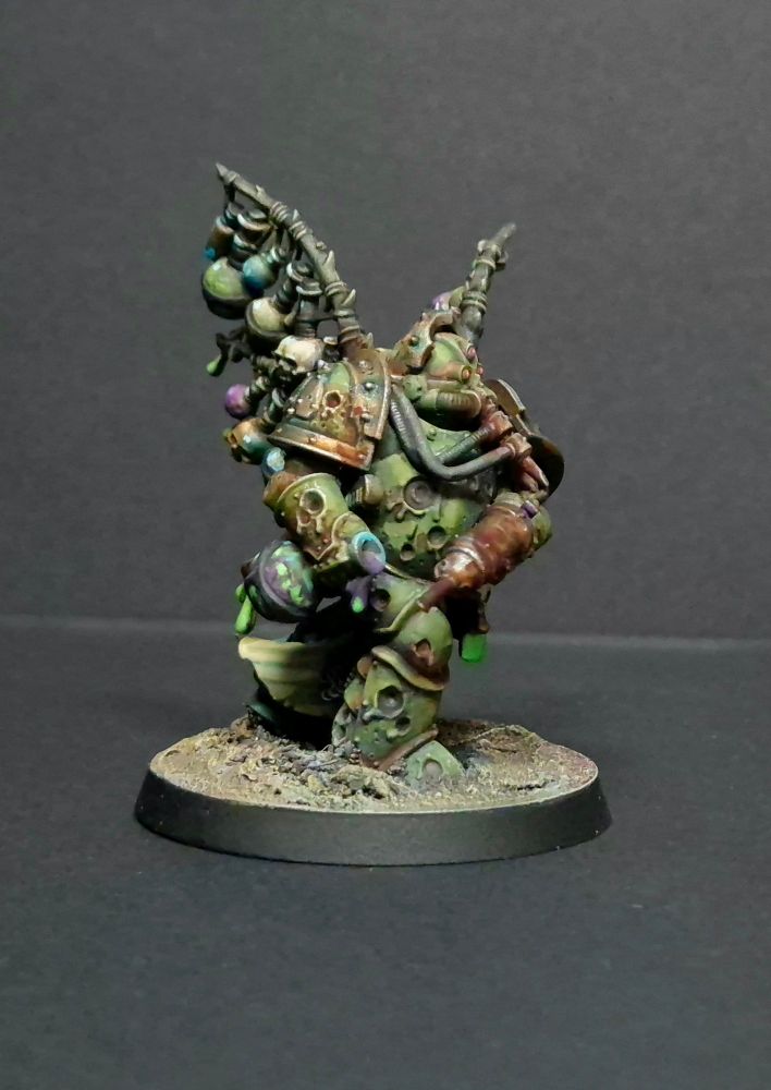 A better shot of his main poison bottle which is a classic purple and green colour