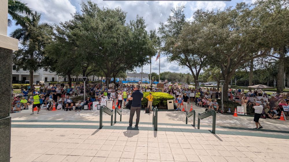 David Jolly speaking on the steps of the Collier County Courthouse. 