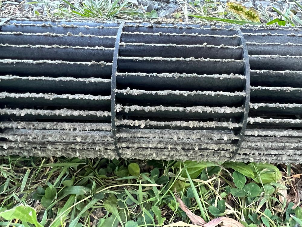 Mini split blower drum coated in gross dust/mold/residue. 