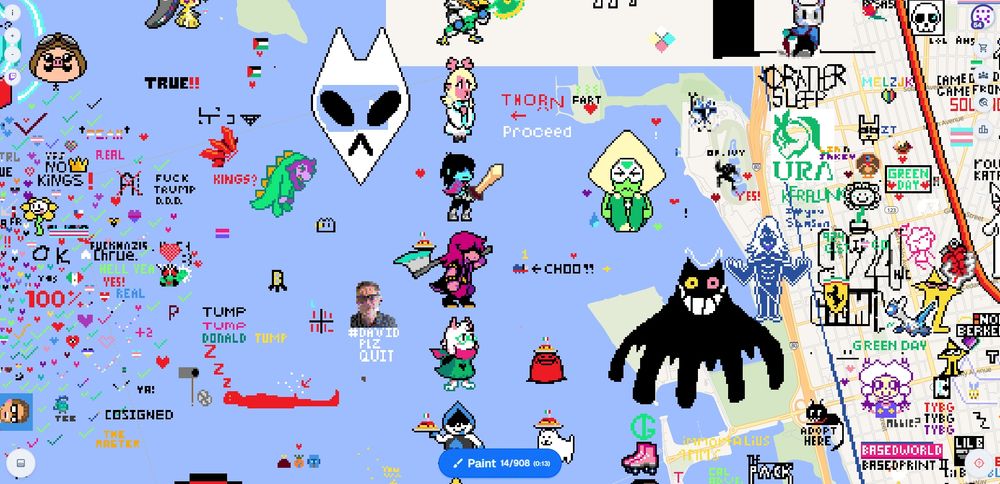 Screenshot of the browser game wplace. I drew Noelle, Kris, Susie, and Ralsei from the game Deltarune to the left of Berkeley, in the bay.

The art surrounding the area is extremely chaotic because of how many people have discovered this site.

Also someone has written the words "Proceed" with an arrow pointing towards Noelle. Someone has also written the word "Thorn" above the arrow.