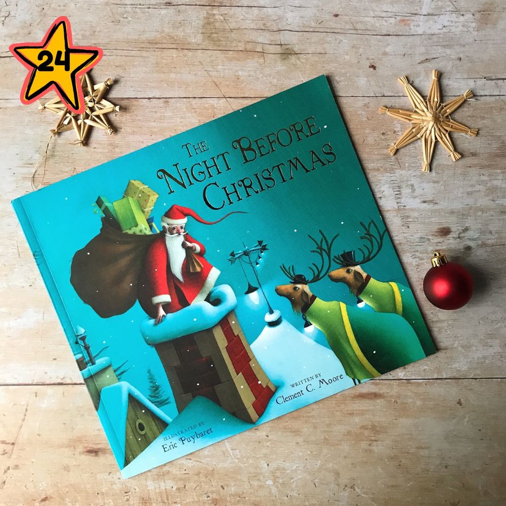 Photograph of the book cover The Night Before Christmas. The cover shows an illustration of Father Christmas with a sack full of presents about to go down a chimney of a snowy rooftop as two reindeer look on. 
