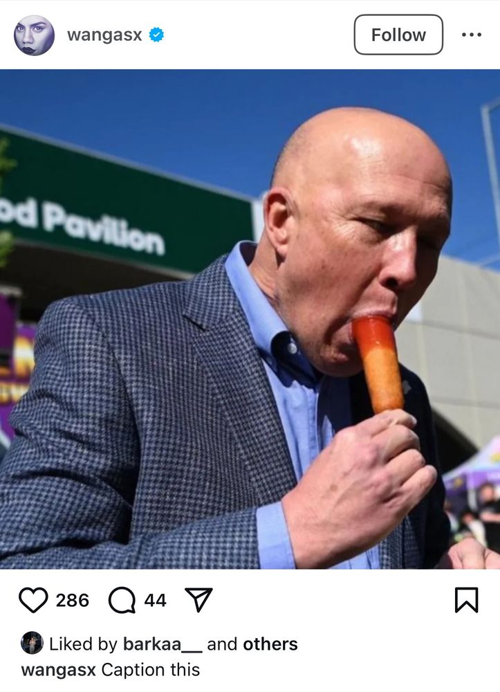 Photo of the repulsive potato sucking on a corn dog. Very repulsive.