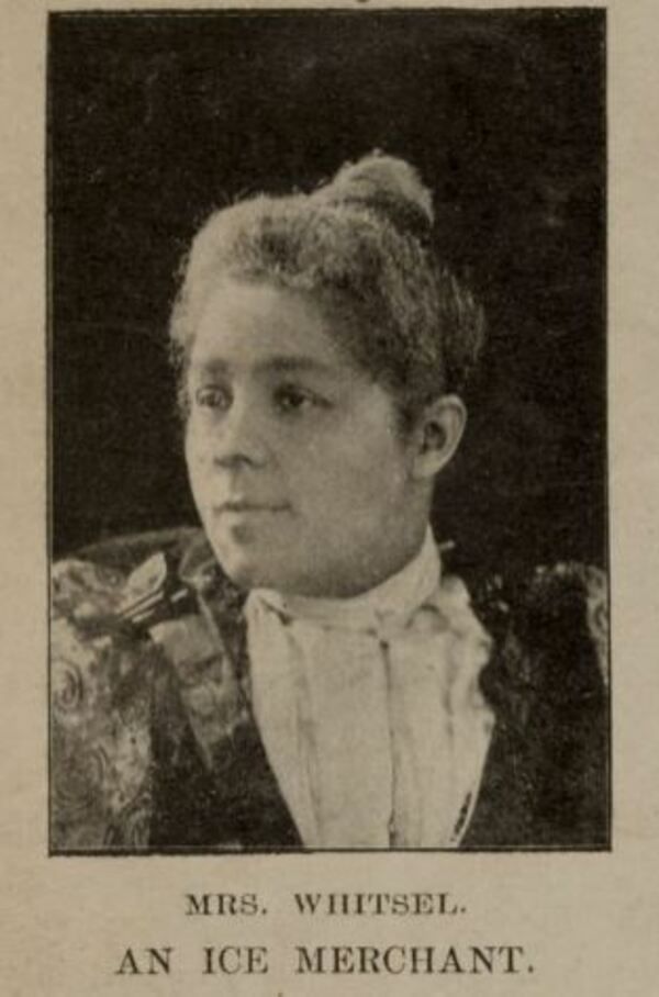 A Black woman wearing a dark dress with a light collar/ruff looks off camera. Her hair is pulled up into a high bun. The caption is "Mrs. Whitsel. An Ice Merchant."