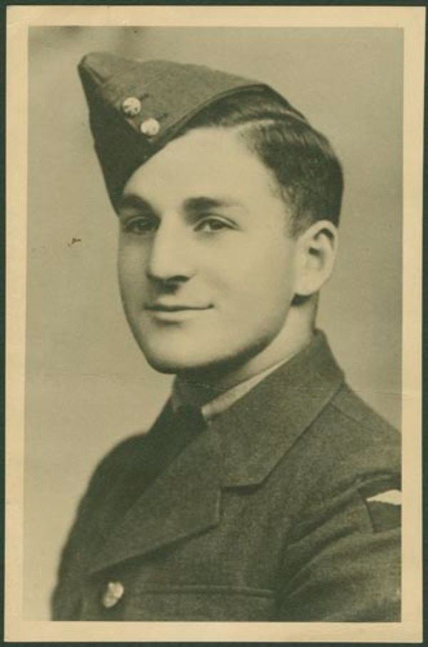 A sepia-toned image of a young man in a military uniform.