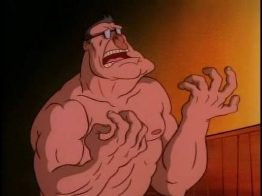 An animated, exaggeratedly muscular man is shown shirtless, standing against a warm, orange-lit background. His skin is pinkish and heavily shaded to emphasize his bulging muscles. He wears small rectangular glasses perched high on his nose. His face is contorted in anguish. The scene has a dramatic, almost comic-book style.