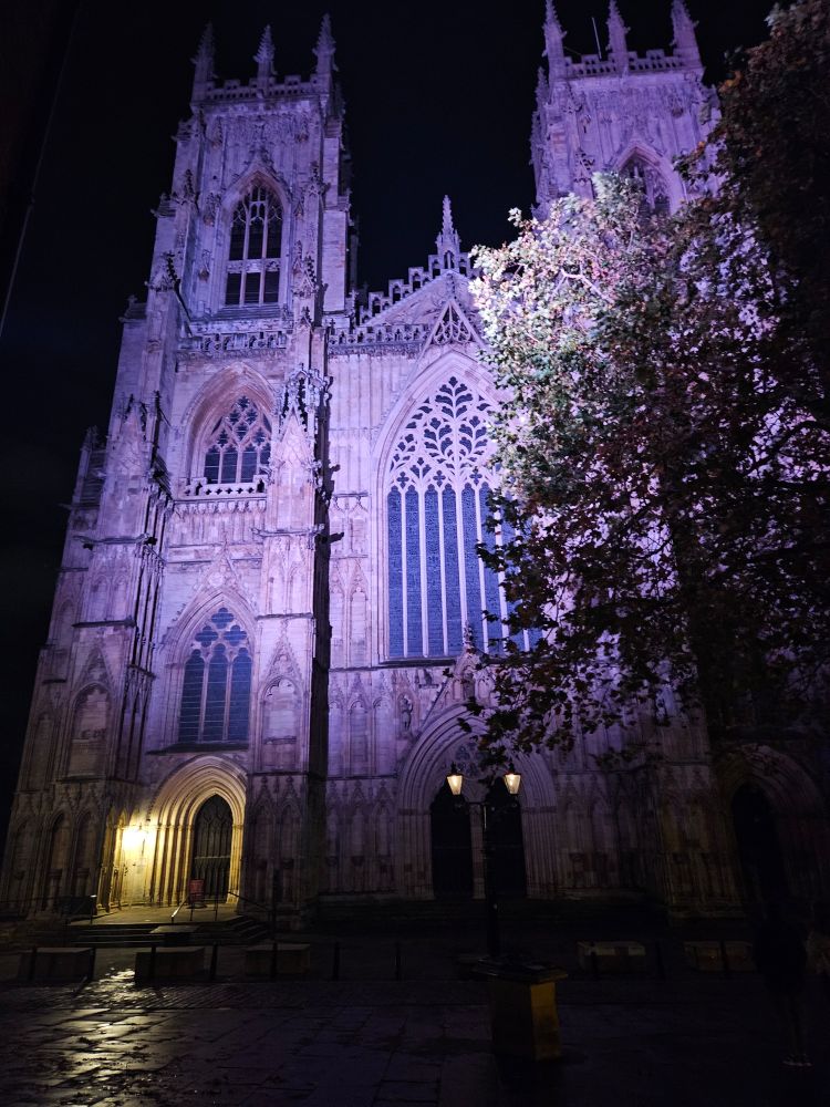 York Minster cathedral lit up at night.