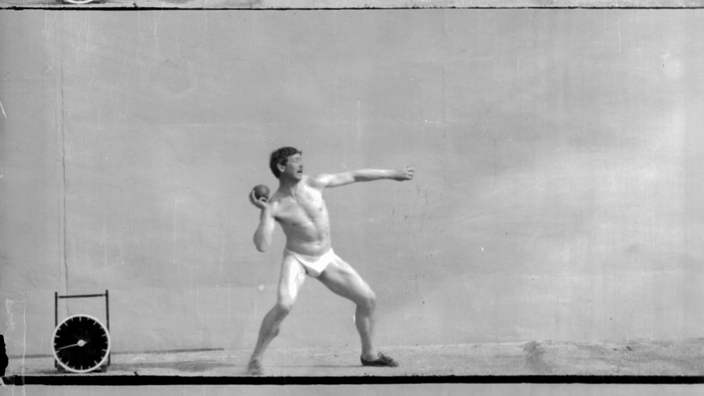 a man shot-putting 
