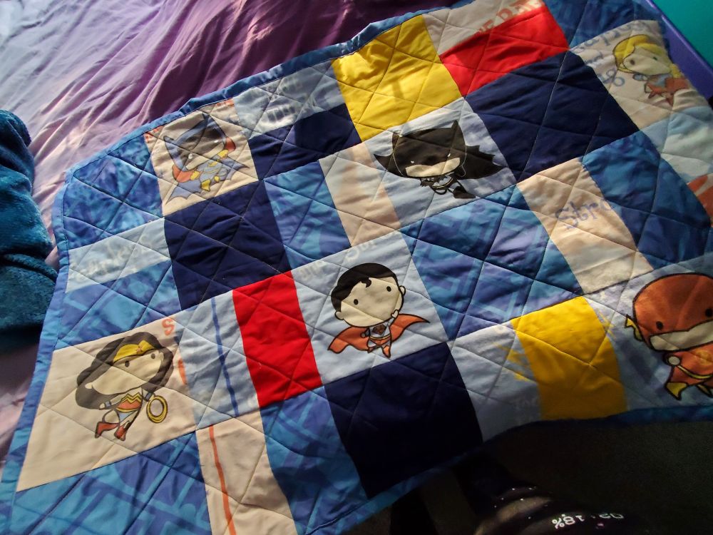 The same quilt, angled to see the quilting lines better.