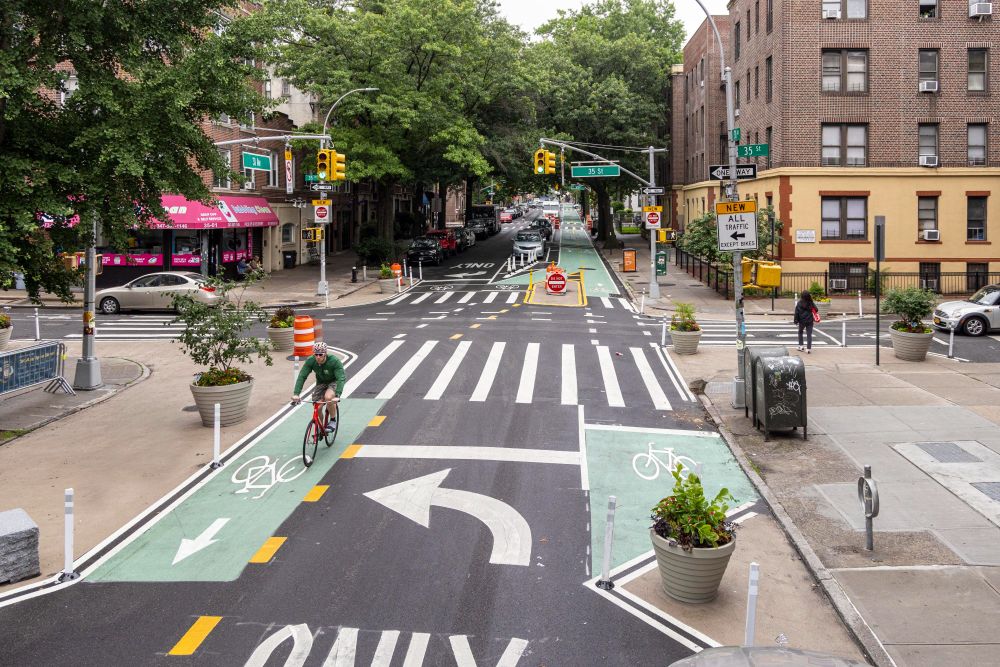 The newly designed intersection of 31st Avenue and 35th Street, with one-way car diversions, two-way cycling connections, expanded pedestrian space, and hardened daylighting. 