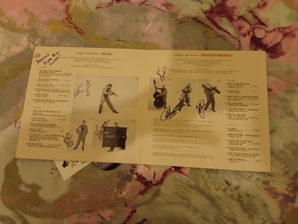 Gatefold inner sleeve of a double LP, signed by The Jive Aces!