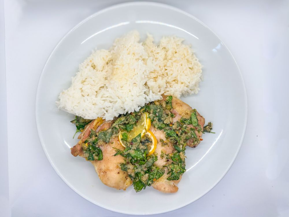 Skinless chicken thighs, salsa verde dried lemons and chicken juice rice 