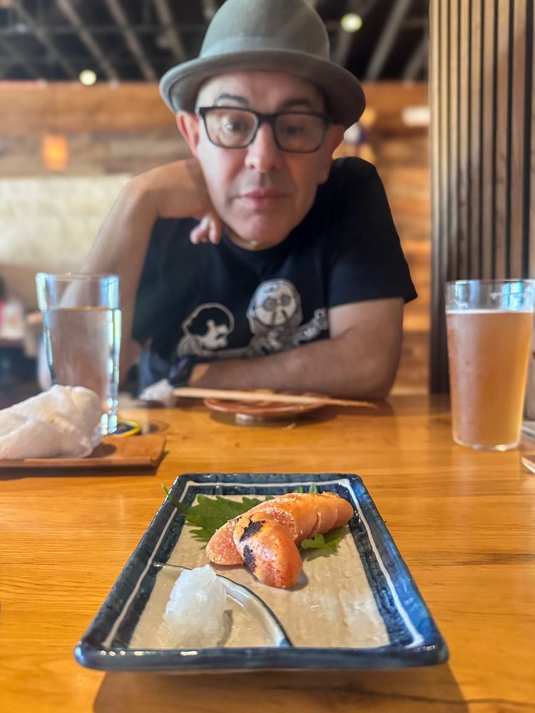Simon eats Mentaiko (fermented pollock roe)