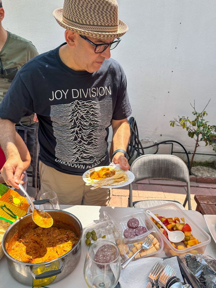 Simon eating chicken tikka masala
