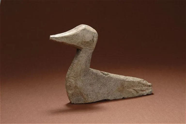 A carved duck figurine on display at the Swedish History Museum, photo by Christer Åhlin, SHM.