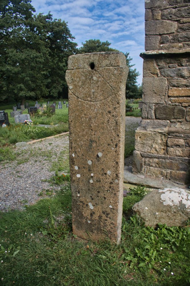 An early stone sundial of C10/C12-century date