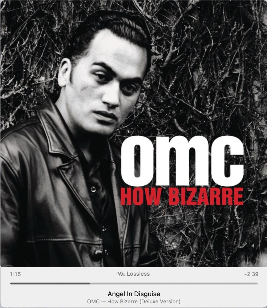 Screenshot of Apple Music Player showing the cover of the album How Bizarre by OMC.  The song Angel in Disguise is playing.  