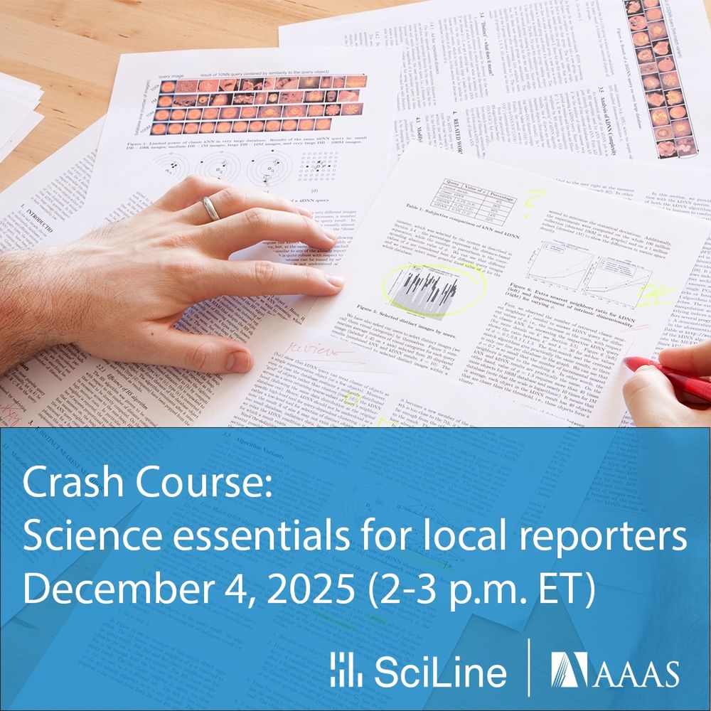 Hand annotating scientific research papers with graphs and images on a wooden desk.