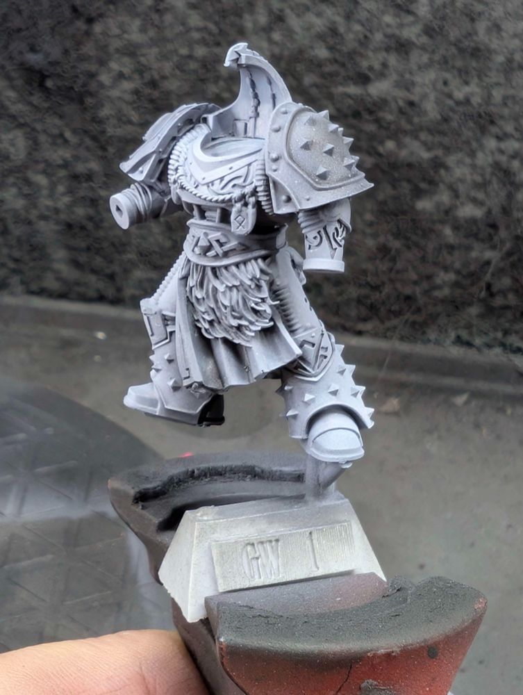 Sub-assembly of a Space Wolves miniature, given shaded/zenithal basecoat before additional paintwork can be applied.