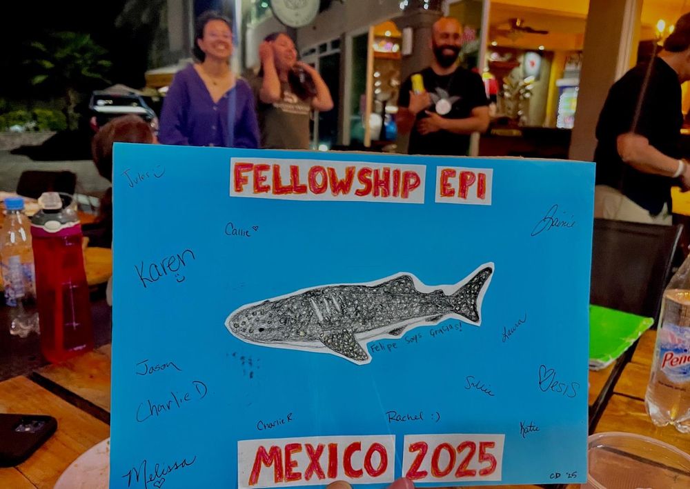 A handmade blue card with a whale shark on the front that says “Fellowship EPI Mexico 2025” 