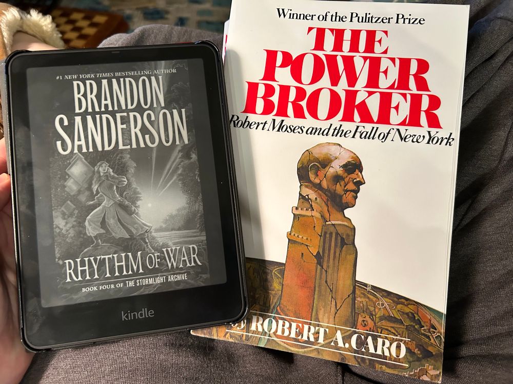 Rhythm of War on a Kindle and The Power Broker