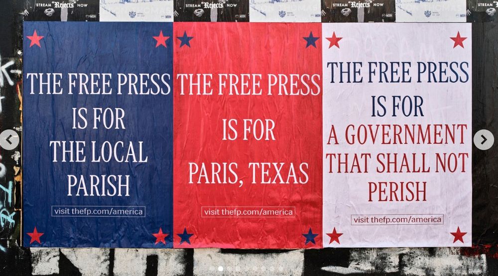 actual signs that say "the free press is for the local parish" "the free press is for Paris, Texas" "the free press is for a government that shall not perish"