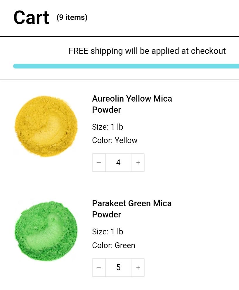 A shopping cart with green and yellow pigments in it
