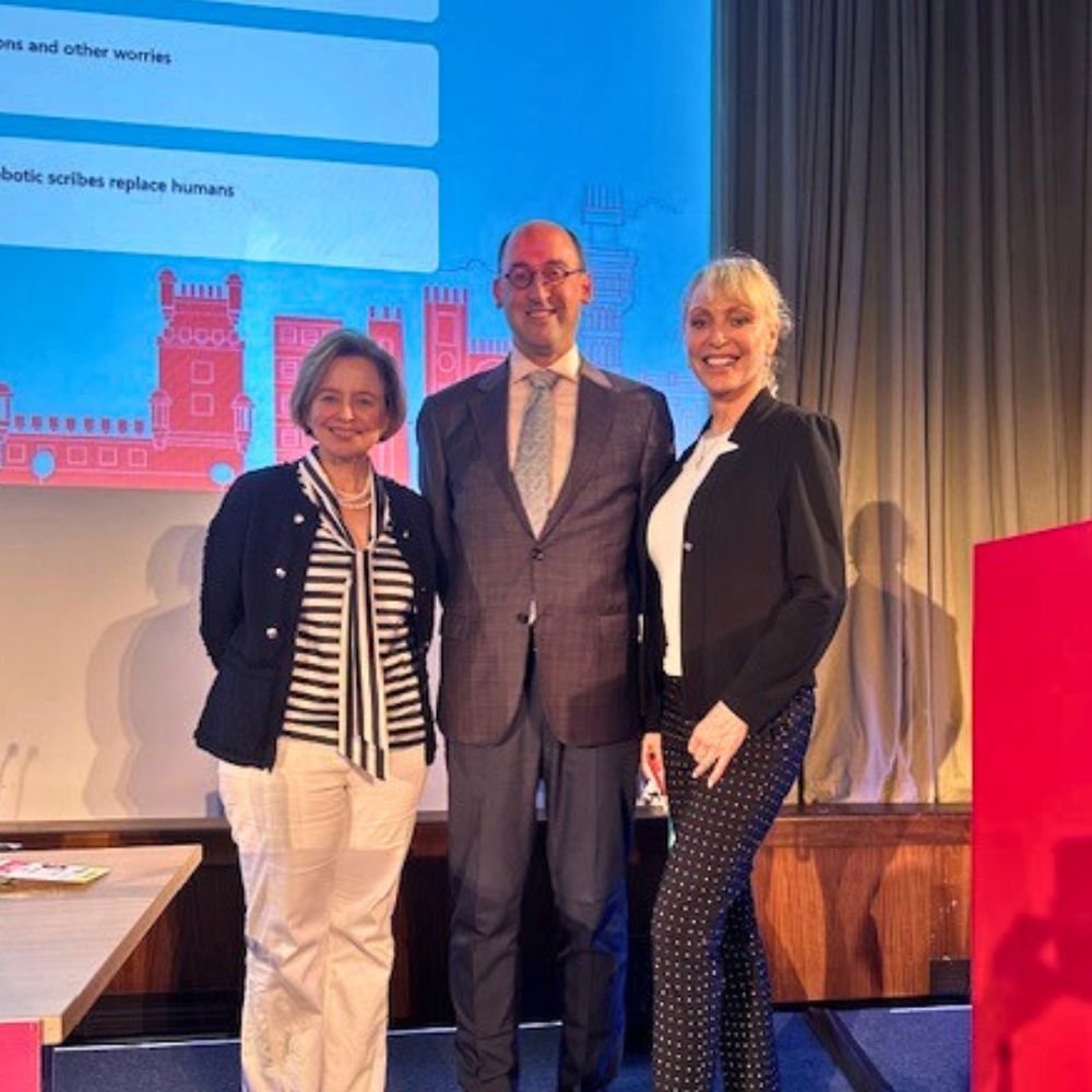 Drs. Maria Bustillo, Mark Nunnally and Rose Berkum standing, smiling at camera.