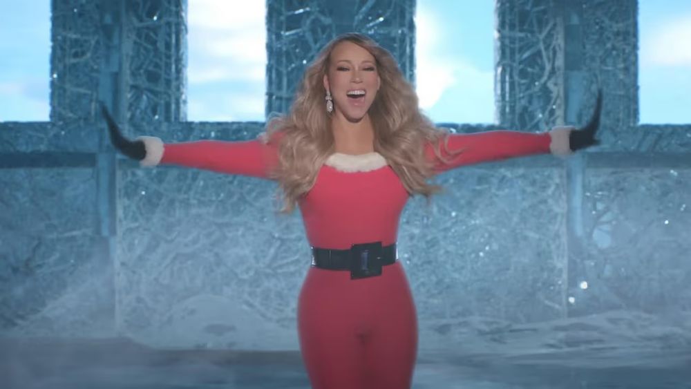 Mariah Carrey singing a high-pitched note, while breaking free from her ice prison. 