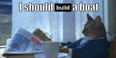 photograph of a cat wearing a blue business jacket reading a newspaper with a cup of tea. Above is the meme caption "I should build a boat", with the word "build" clearly overlaying the word "buy" from the classic original meme "I should buy a boat".