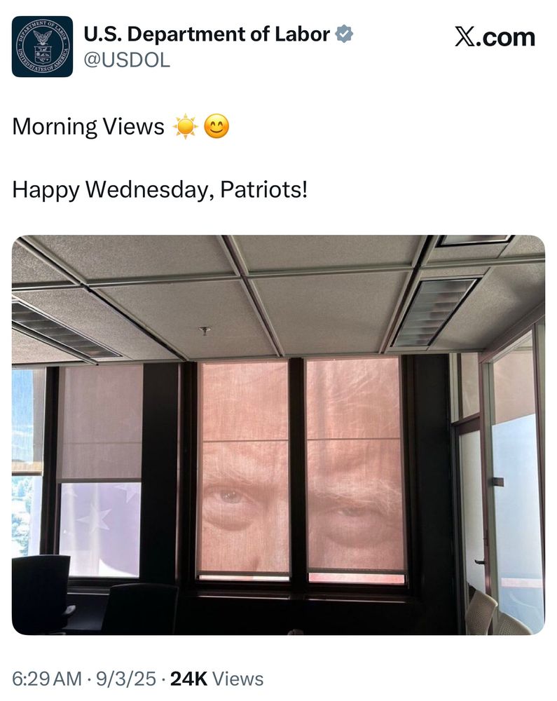 Photo from Twitter showing a view out of an office window in DC. The image shows Trump’s face staring through the window menacingly. The text from the tweet: U.S. Department of Labor v @USDOL X.com Morning Views Happy Wednesday, Patriots!