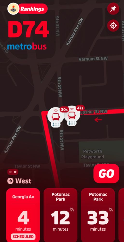 Two buses on the same route right behind each other.