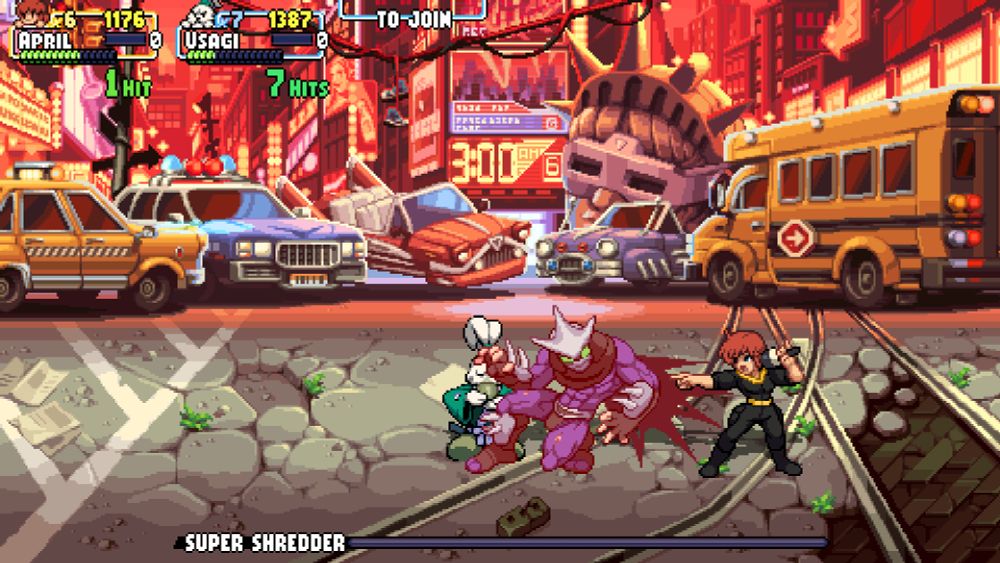 Screenshot from Teenage Mutant Ninja Turtles: Shredder's Revenge, featuring April O'Neal and Miyamoto Usagi.