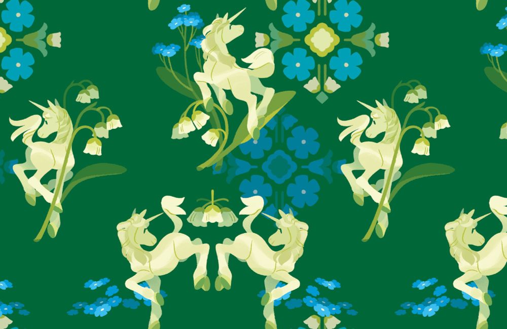 A pattern featuring a unicorn prancing among lily of the valley and forget me not flowers 