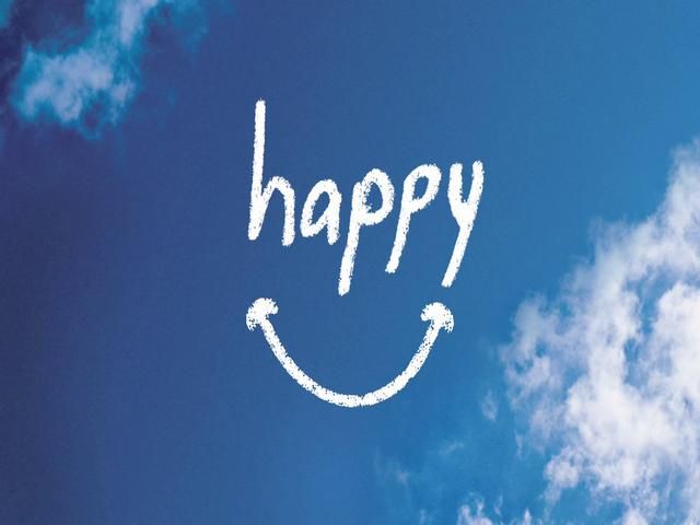 The word HAPPY written in the sky. 

thehappiestmanintheworld.com