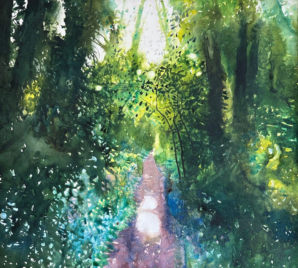 Watercolour painting of a woodland path in dappled spring sunlight, with dark greens either side. The path looks towards the early morning sun and leads to a lighter distance.