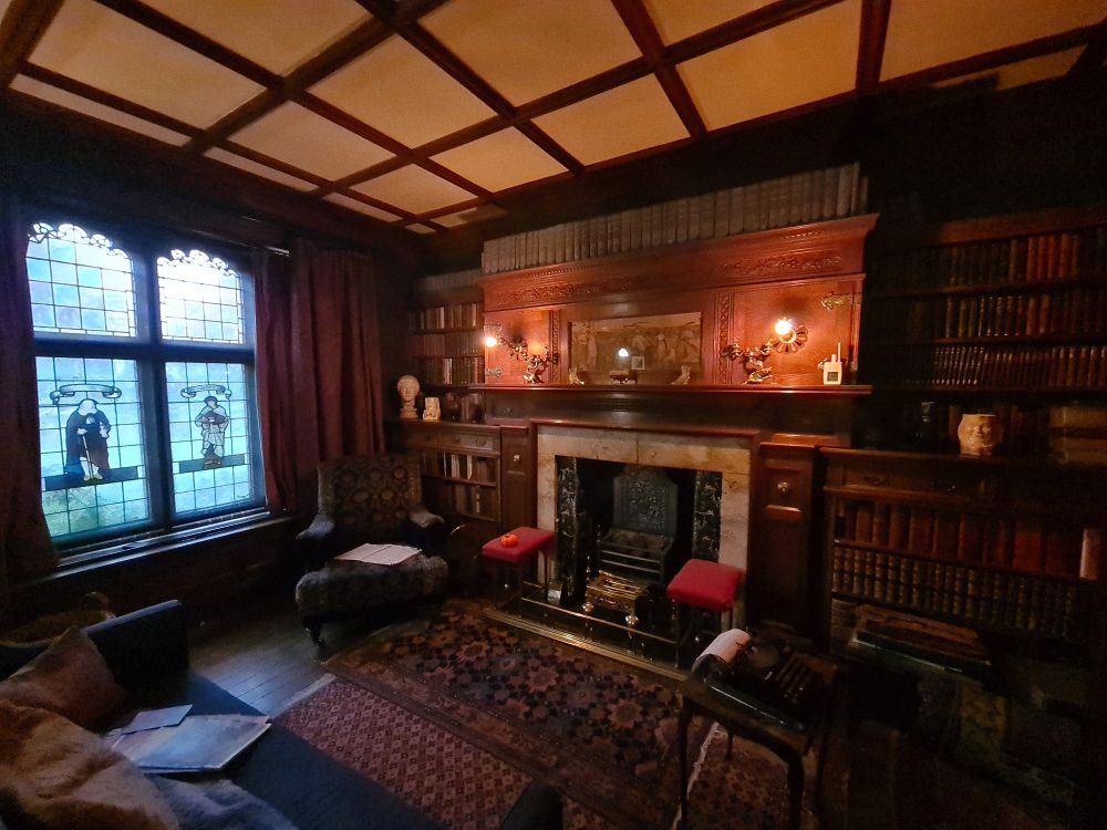 The very cosy fireplace in the house library.