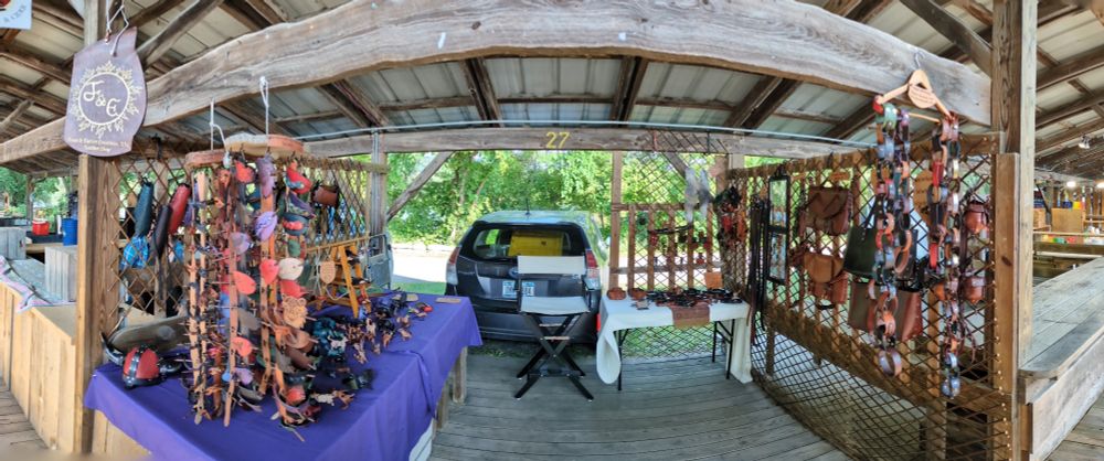 A panoramic photo of a leather shop.