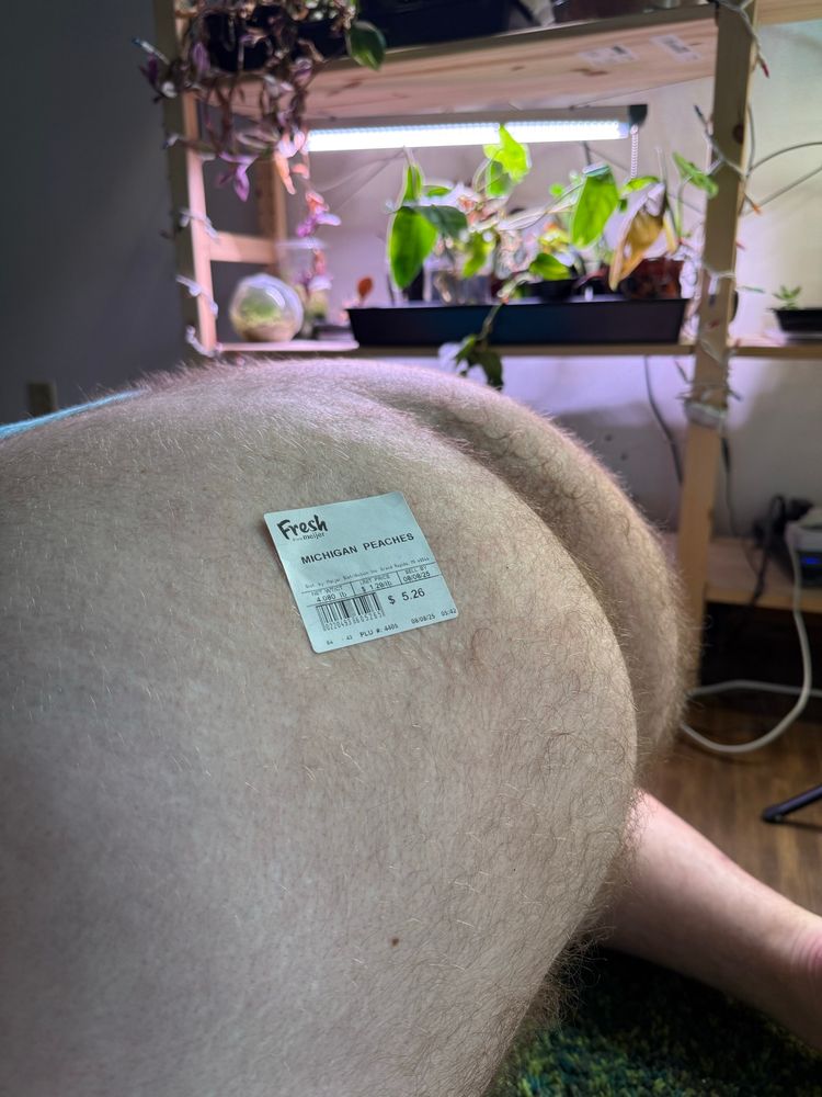 Photo of my bare ass from the side. Featuring a produce sticker for Michigan peaches 