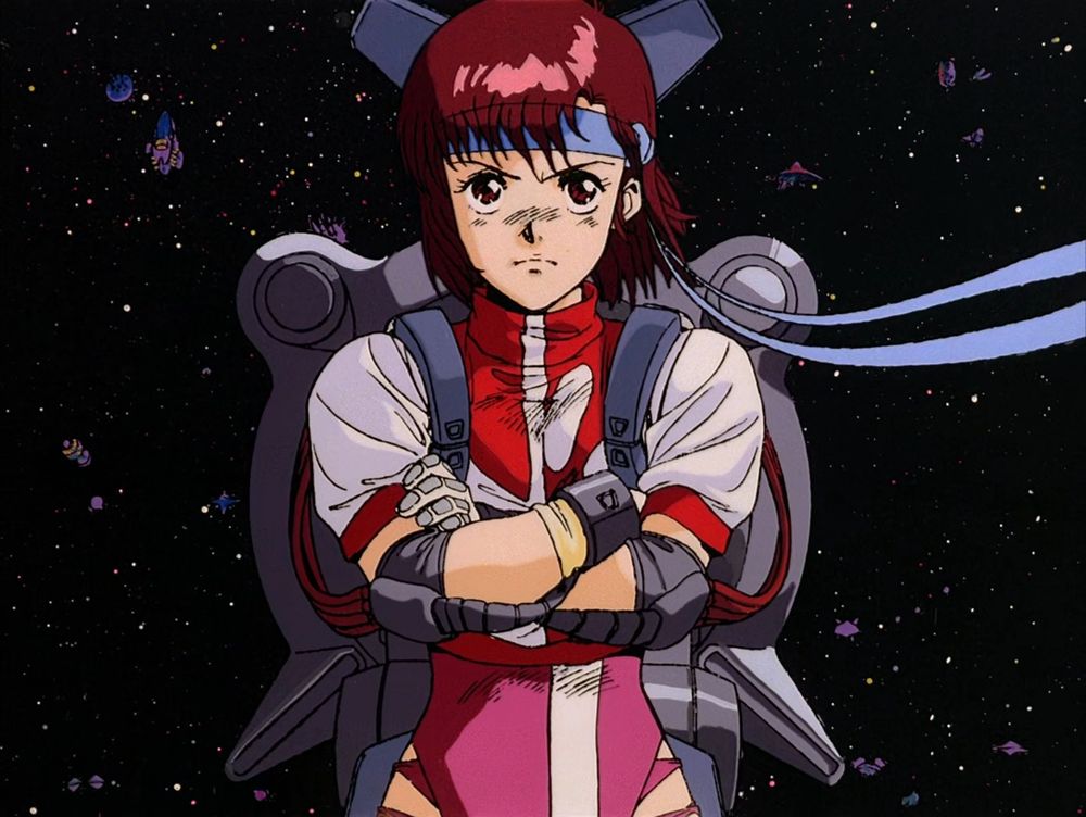 Capture d'écran de Gunbuster, avec Noriko les bras croisés dans le Gunbuster