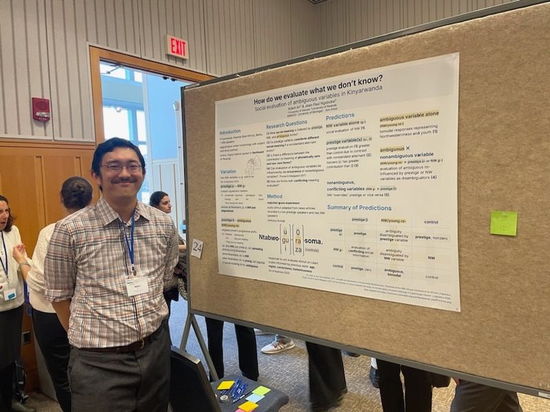 Me with my poster. It is called "How do we evaluate what we don't know?"