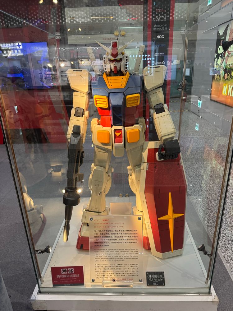 Gundam RX-78 statue. The English description translated from Chinese is quite funny.