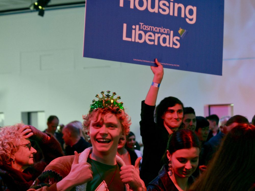 Greens and Liberal supporters in the crowd