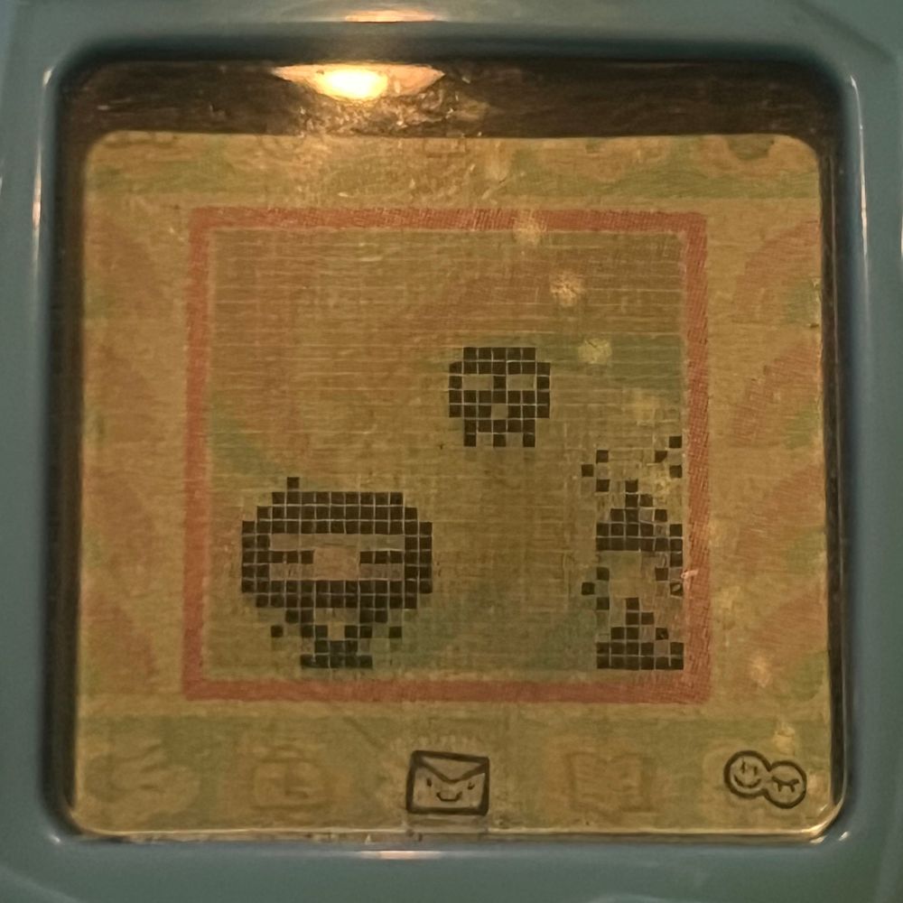 Tamagotchi on the cusp of death. Headache + surrounded by shit. T minus 10 mins
