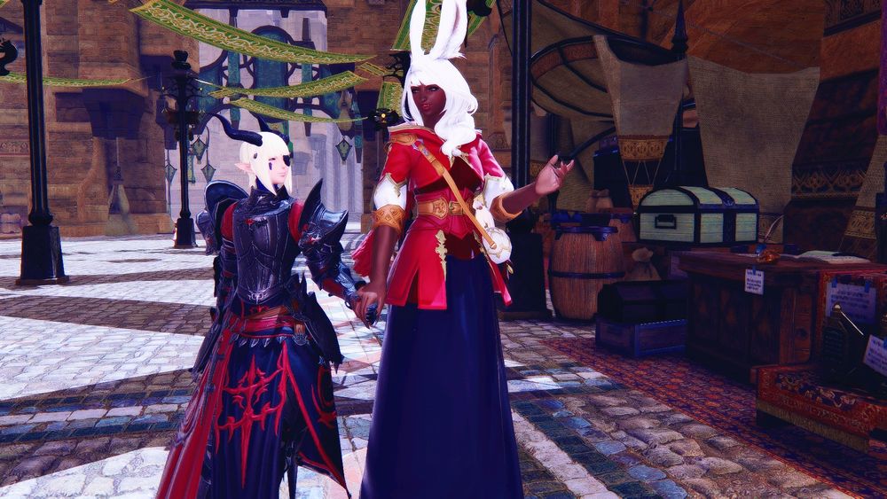 Manadis and Reginleif walk through the markets of Ul'dah. They happily engage in conversation as they walk.